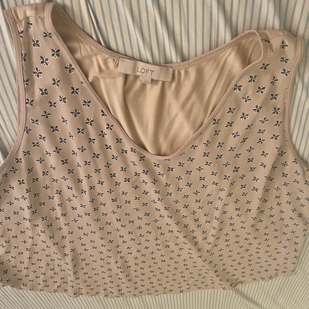 Pretty beige blouse with black flowers. Perfect for the workplace